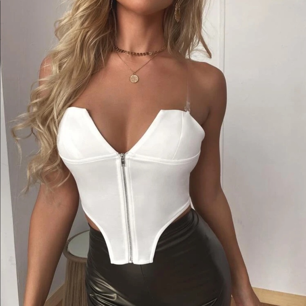 White zip up top with clear straps